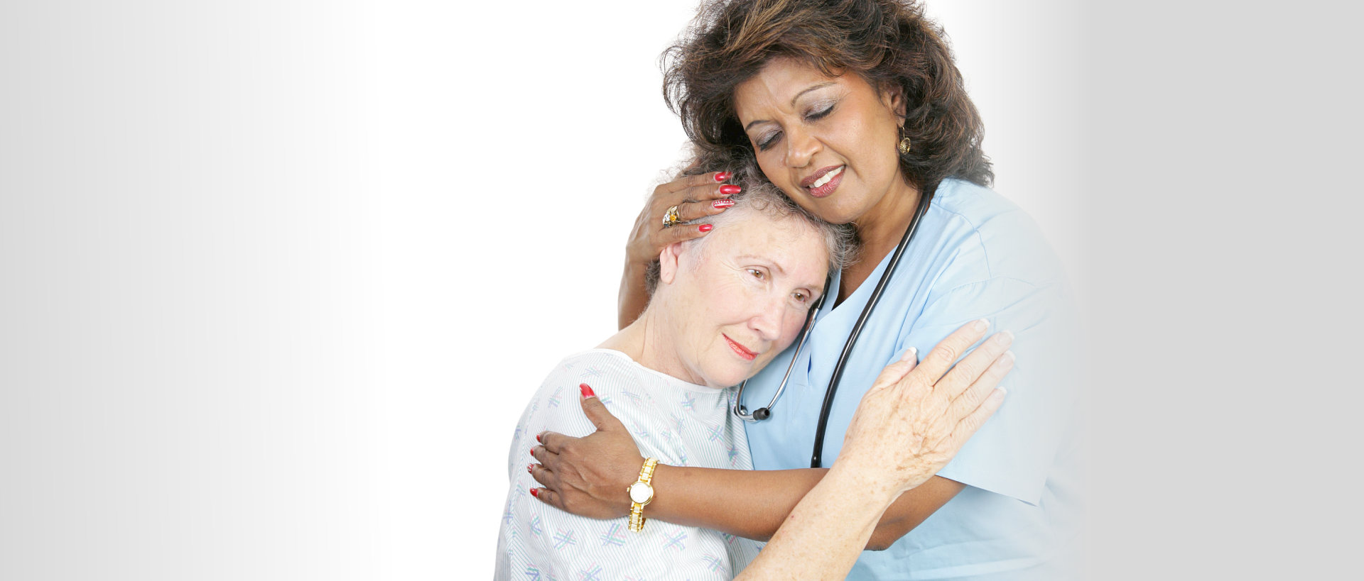 caregiver comforting her patient